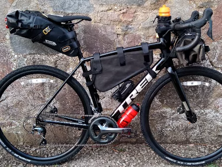 Drop bar touring bike with bikepacking bags